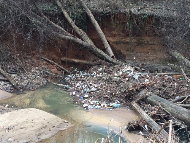 Trash and debris in a creek